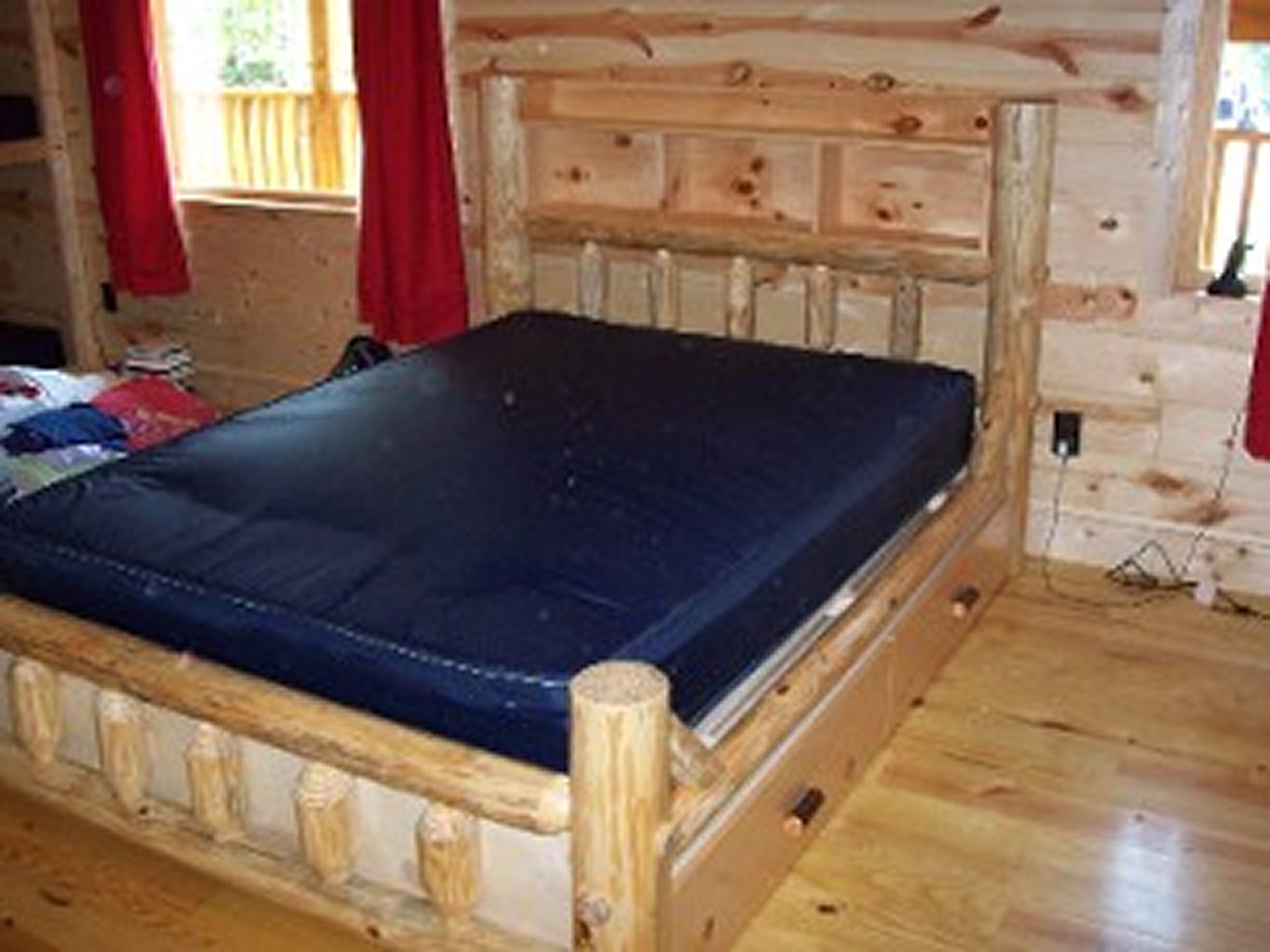 Log bed with drawers